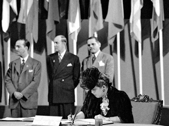 Miss Minerva Bernardino, President, Inter-American Commission of Women, member of the Delegation from the Dominican Republic, signing the United Nations Charter at a ceremony held at the Veterans' War Memorial Building on 26 June.